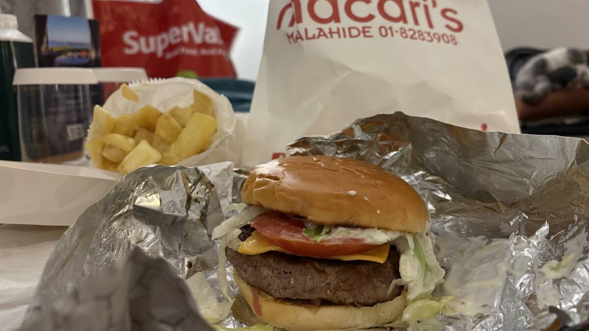 The secret to late-night Irish food isn't what you think. Macari's burger and chips, consumed in a hotel room in Malahide is the perfect meal when you want a low-key night. Picture by Sarah Falson
