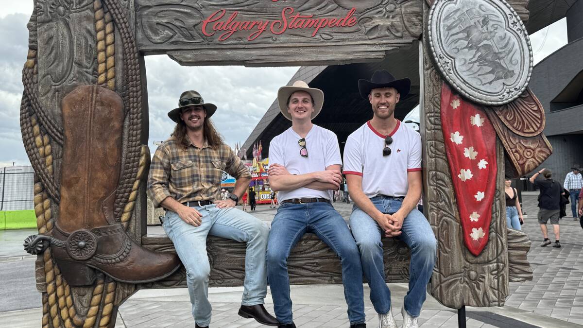 James (centre) with his cousin Murray (left) and friend Jesse at the Calgary Stampede. James (centre) with his cousin Murray (left) and friend Jesse at the Calgary Stampede.
