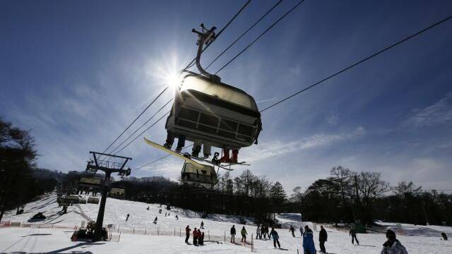 People skiing in the resort town of Karuizawa near Nagano, Japan. 
