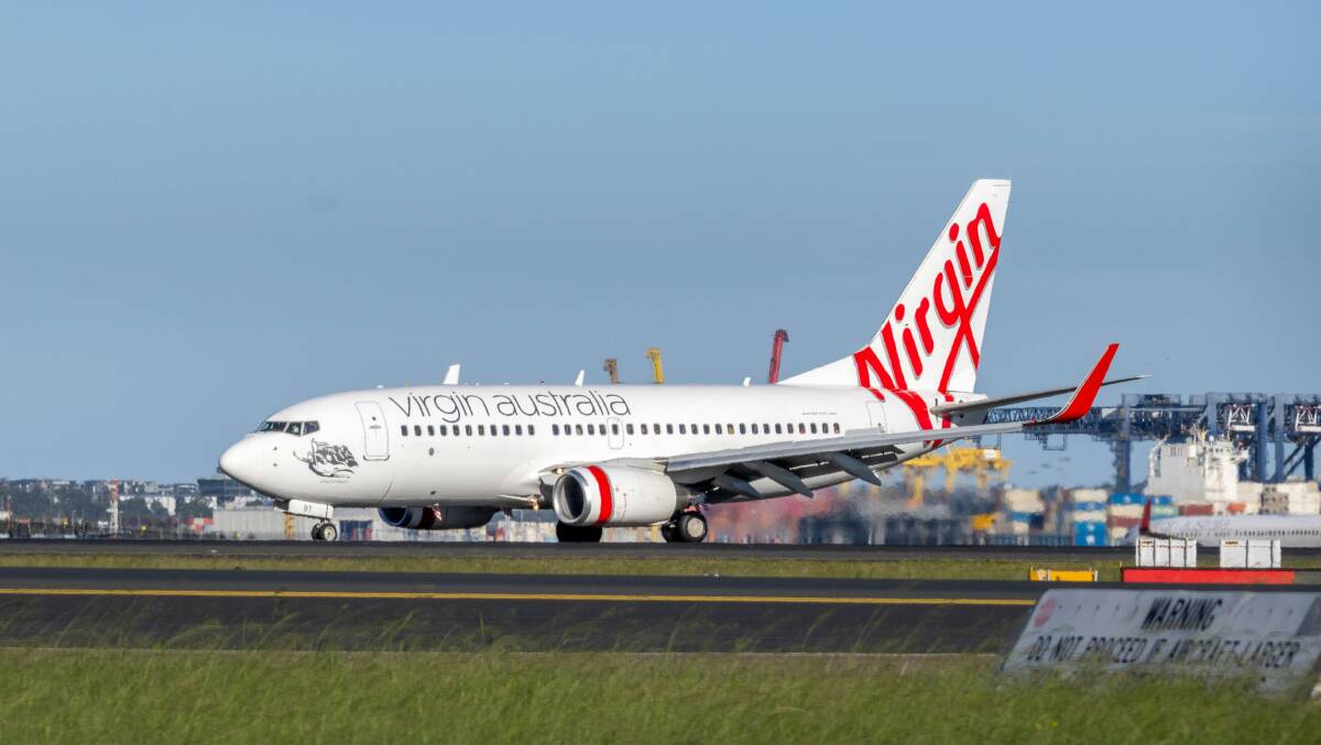Virgin Australia aircraft on the runway. Picture from Unsplash/Peaky_82