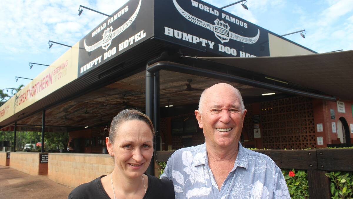Humpty Doo Hotel owner Rod Parry and manager Alex Taylor sell loads of items bearing the pub label. Picture by Lloyd Jones/AAP PHOTOS Humpty Doo Hotel owner Rod Parry and manager Alex Taylor sell loads of items bearing the pub label. Picture by Lloyd Jones/AAP PHOTOS