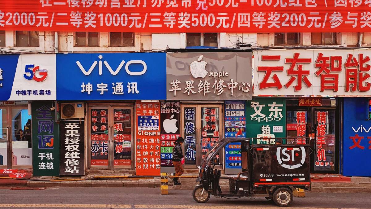 A shopping strip in China spruiking numerous telco brands. Evdokiya Lebedeva