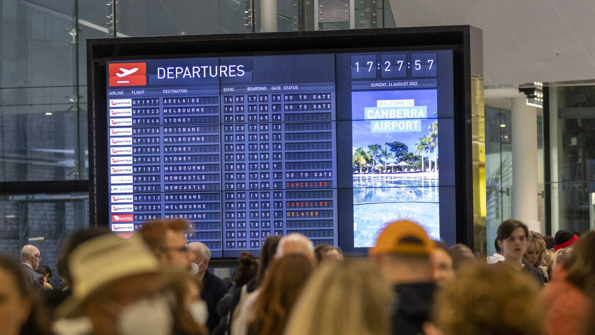 The departures board showing flights cancelled at Canberra Airport. Picture by Keegan Carroll The departures board showing flights cancelled at Canberra Airport. Picture by Keegan Carroll