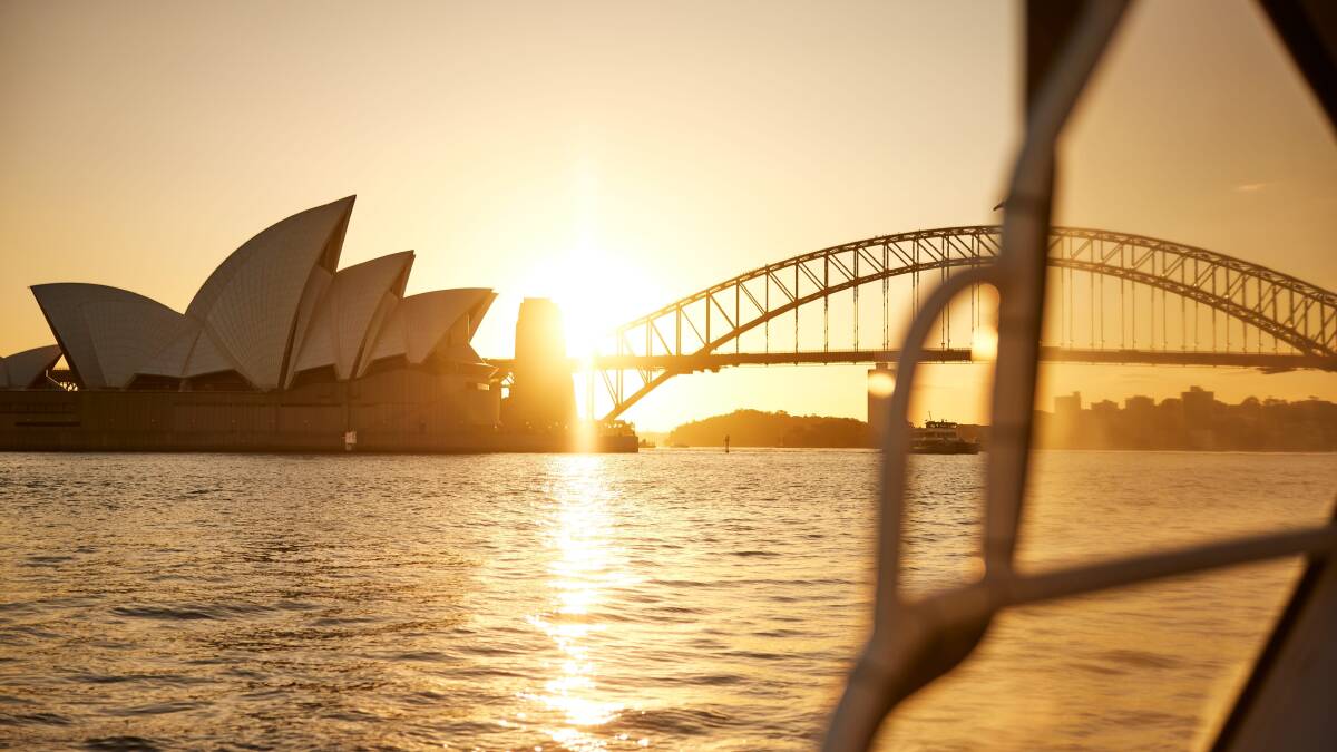 Sunrise over Sydney Harbour, from Sydney Showboats. Picture by Destination NSW