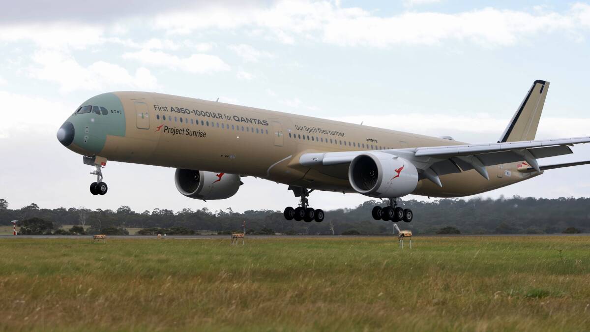 The Qantas Project Sunrise test flight touches down at Melbourne Airport.