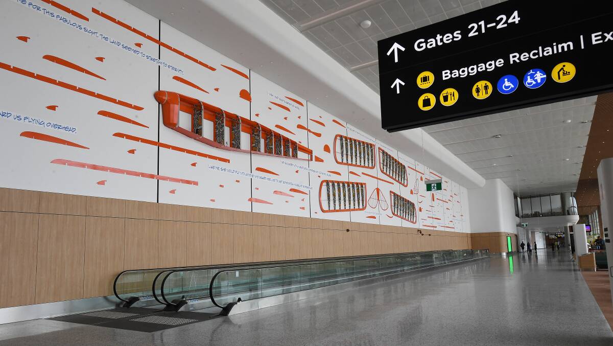An art installation depicting Walton's de Havilland aircraft above the travelator at WSI's domestic terminal.