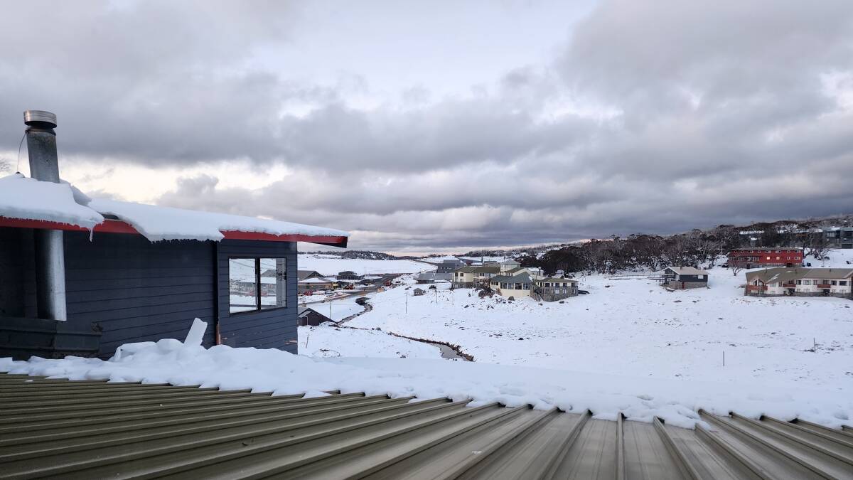 Waking up to 20 centimetres of glorious snowfall on a crisp September morning, with a view from the Matterhorn Lodge at Perisher. Picture by Desiree Savage