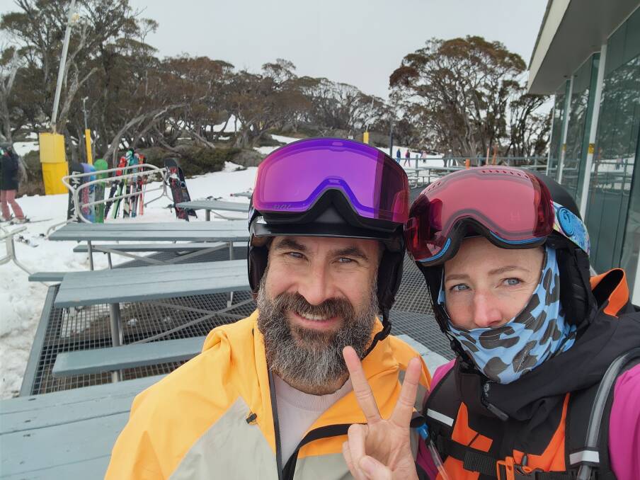Writer Desiree Savage and Simon Cohen with a quick stop at Mid Station before sliding down Happy Valley and hitting little, natural jumps. The morning after a spring blizzard at Perisher.