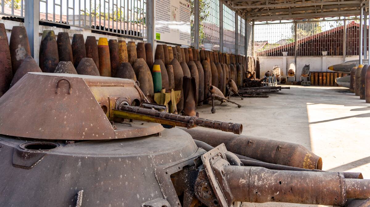 The piles of rusting ordnance collected since the US bombing campaigns in the early 1970s. Picture by Michael Turtle