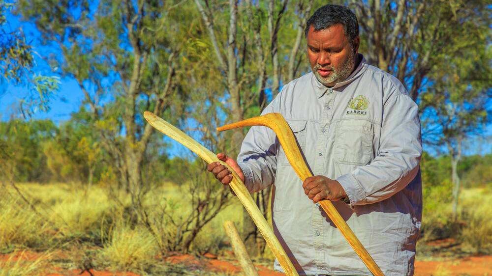 Peter Abbott and his family run Indigenous cultural tours at Karrke, near Kings Canyon. Picture Shutterstock