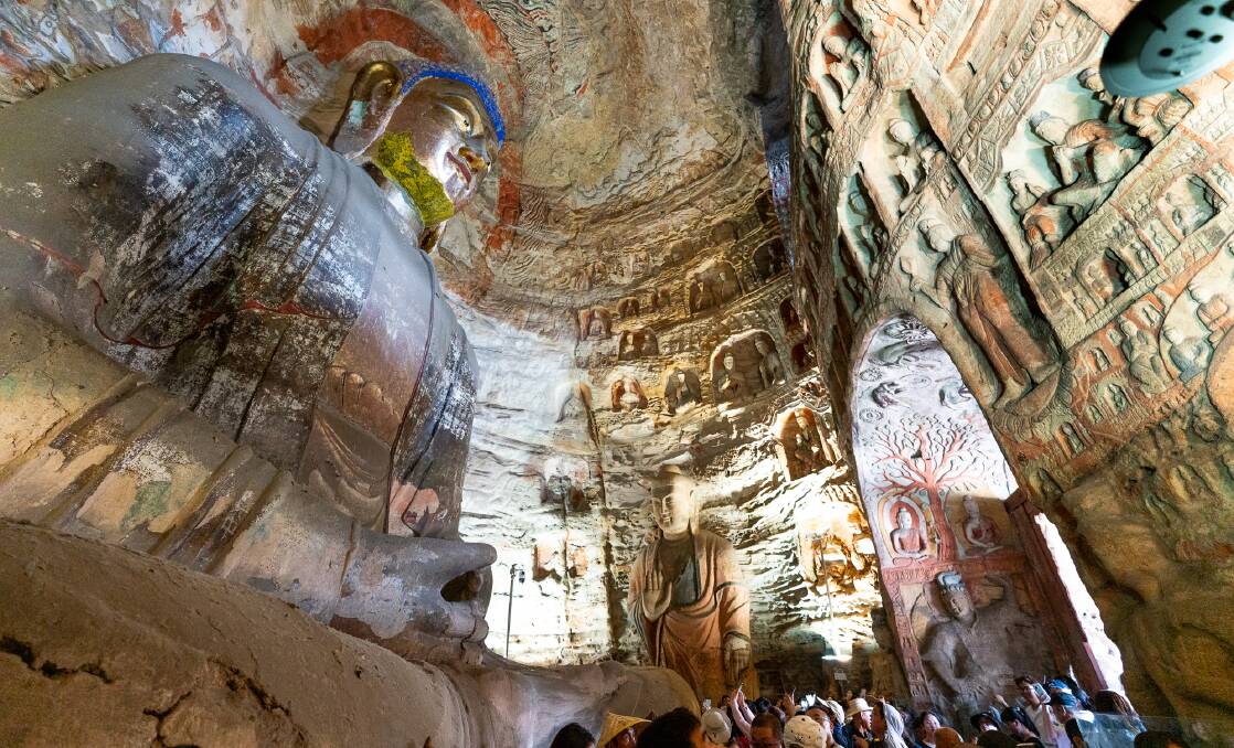 The 17-metre-high seated Buddha in Cave 5. Picture by Michael Turtle