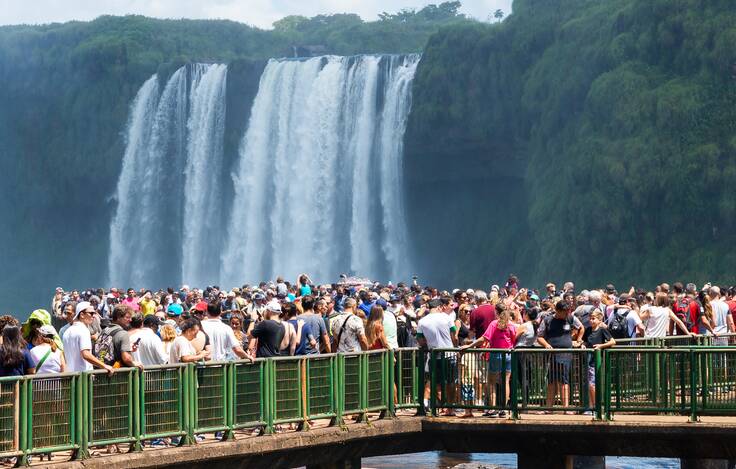 Tourists crowd the viewing platform at Iguassu Waterfalls in Brazil. Picture Shutterstock