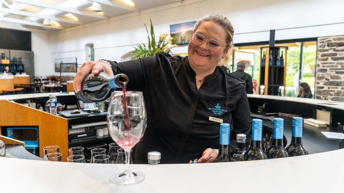 Penny McNamara pours a glass of wine at Seppeltsfield. Picture by Michael Turtle Penny McNamara pours a glass of wine at Seppeltsfield. Picture by Michael Turtle
