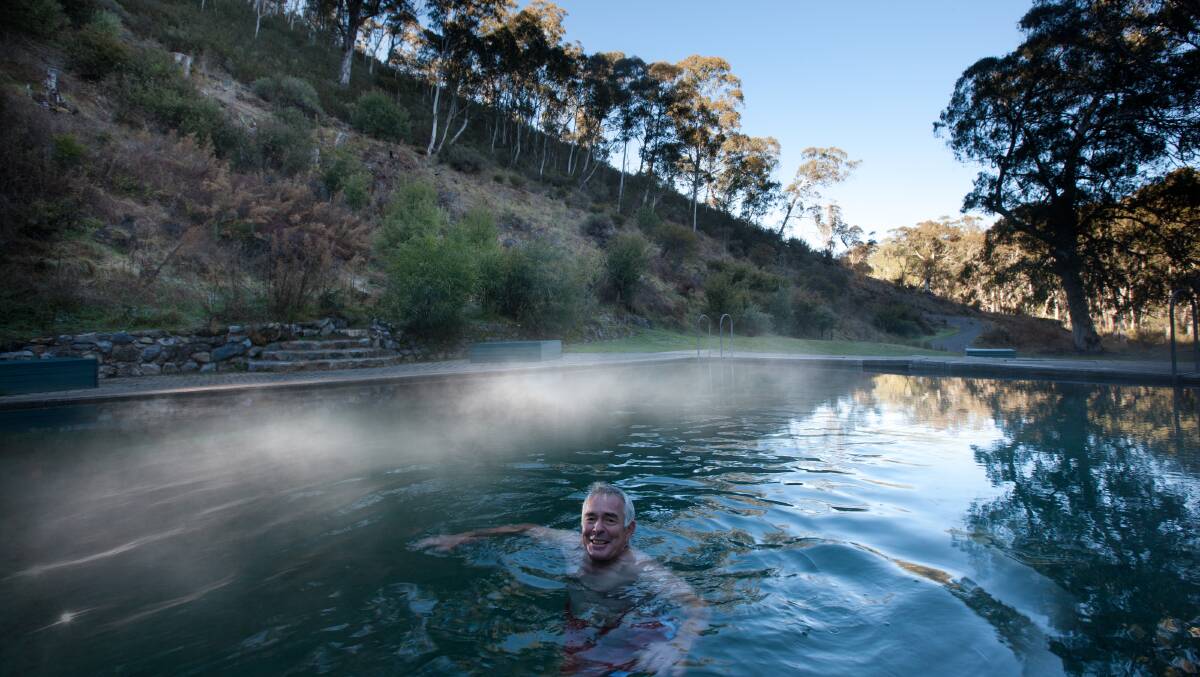 Mist rises off Yarrangobilly's thermal pool at dawn. Picture by Murray Vanderveer