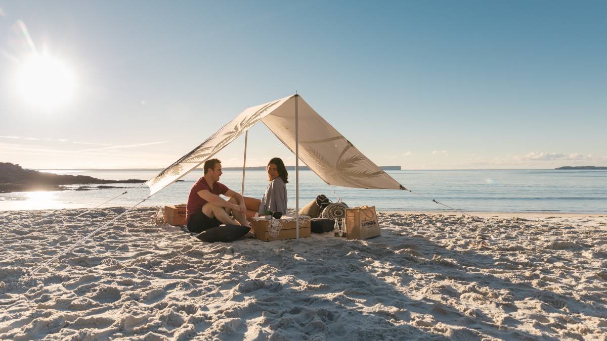 Take in – or protect yourself from – the rays at Blenheim Beach at Jervis Bay. Picture: Destination NSW