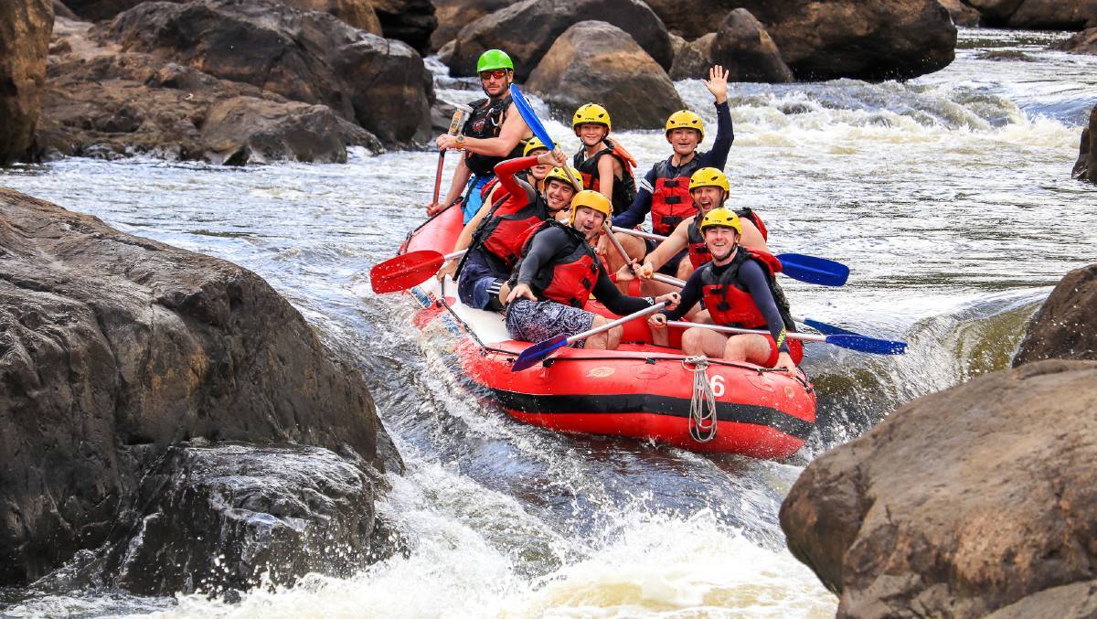 Cairns adventure tourism with canyoning, diving and swimming