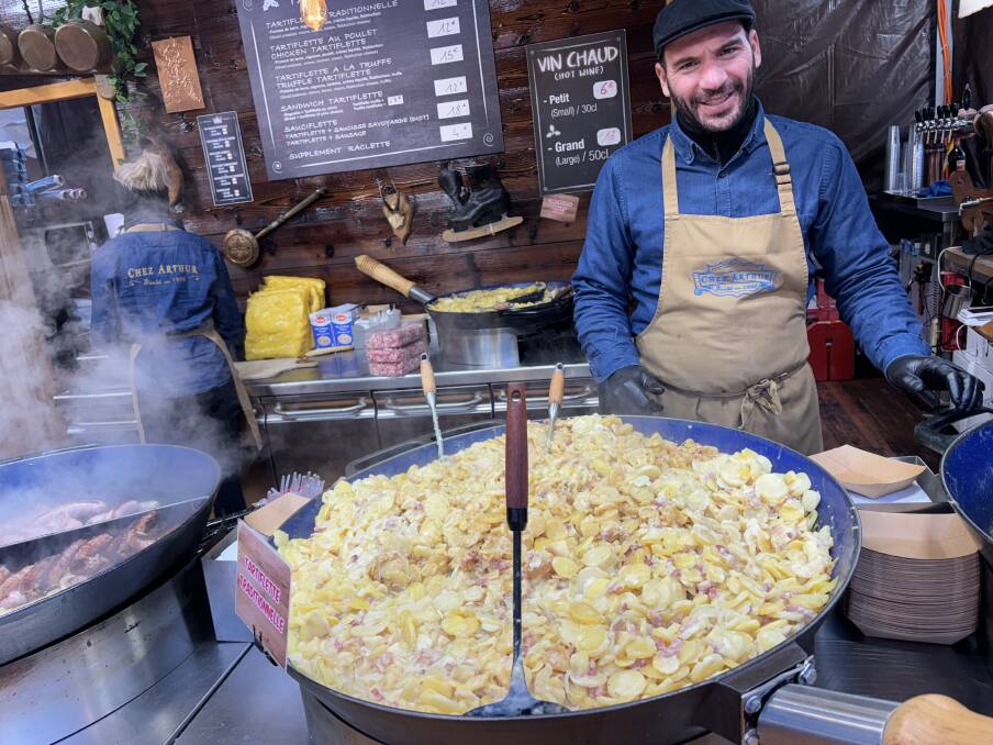 Multiple stalls sell creamy tartiflette pasta at the Paris Christmas markets. Picture by Kate Cox