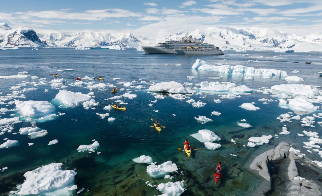 Guests kayaking in Neko Harbour, Antarctica. Guests kayaking in Neko Harbour, Antarctica.