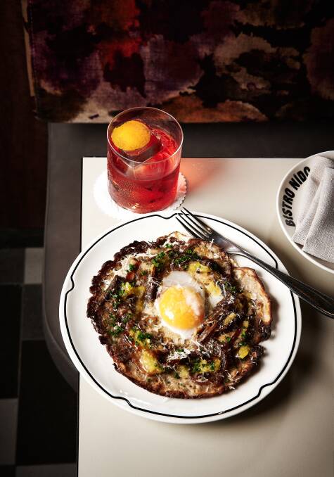 Bistro Nido's Buckwheat Galette, Confit Duck Leg and Egg, Gruyere, Cumquat Shoyu. Picture: Richard Mortimer. Bistro Nido's Buckwheat Galette, Confit Duck Leg and Egg, Gruyere, Cumquat Shoyu. Picture: Richard Mortimer.