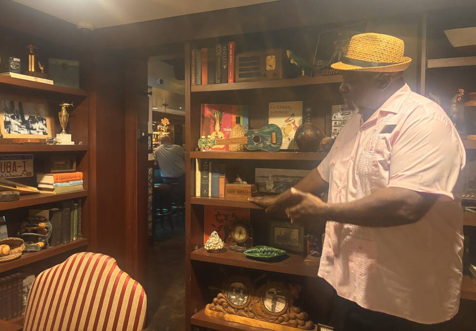 Entry to Las Floriditas is through a sliding bookcase. Picture by Kate Cox Entry to Las Floriditas is through a sliding bookcase. Picture by Kate Cox