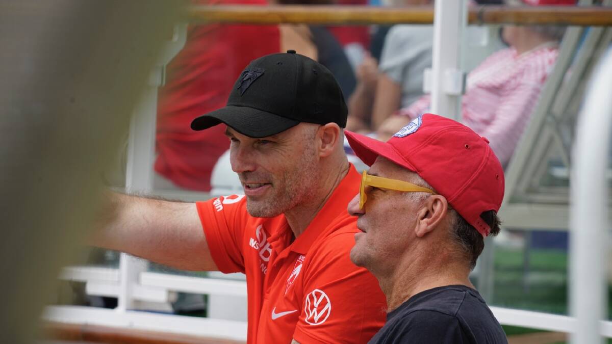Swans CEO Tom Harley watches the highlights on the big screen. Picture: Zhenshi van der Klooster Swans CEO Tom Harley watches the highlights on the big screen. Picture: Zhenshi van der Klooster