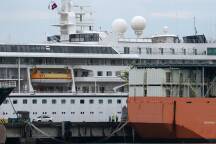 Hundreds stranded in Cambodia after residential world cruise suspended