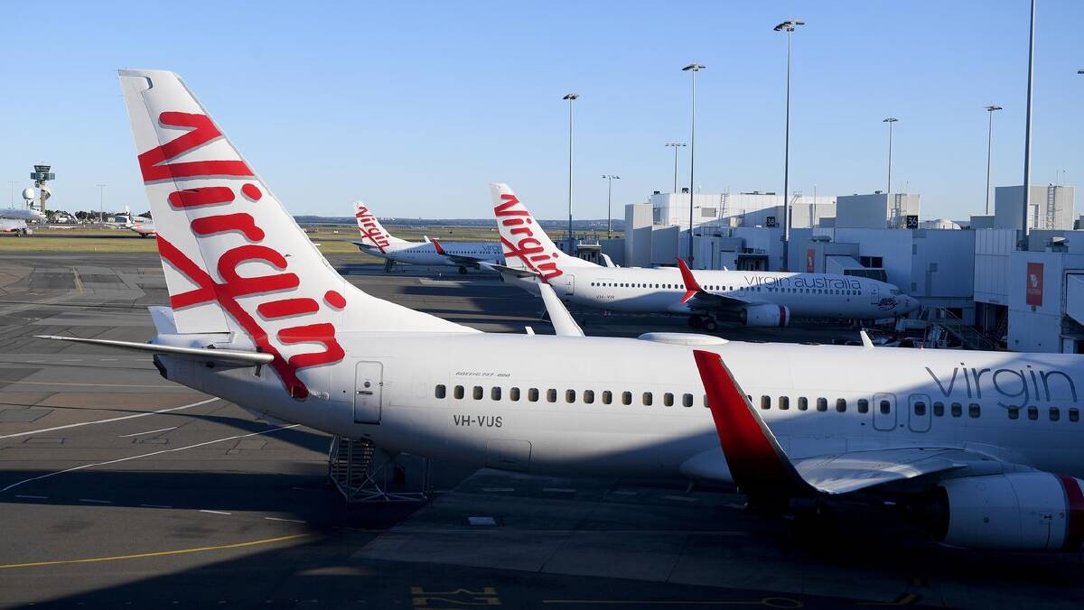 Virgin Australia has welcomed the deal with Qatar Airways as a "new era". (Dan Himbrechts/AAP PHOTOS)