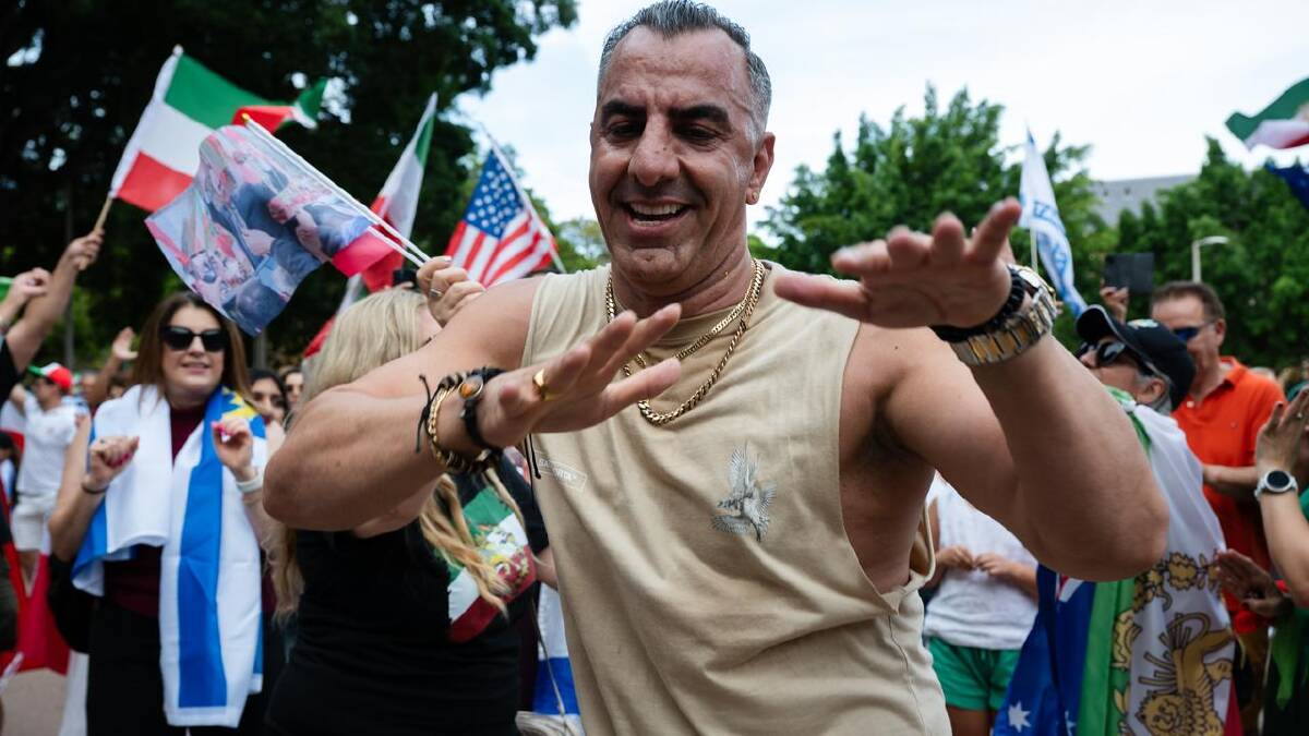 Iranian Australians are celebrating the fall of Ayatollah Ali Khamenei after US-Israeli air strikes. (Sarah Wilson/AAP PHOTOS) Iranian Australians are celebrating the fall of Ayatollah Ali Khamenei after US-Israeli air strikes. (Sarah Wilson/AAP PHOTOS)