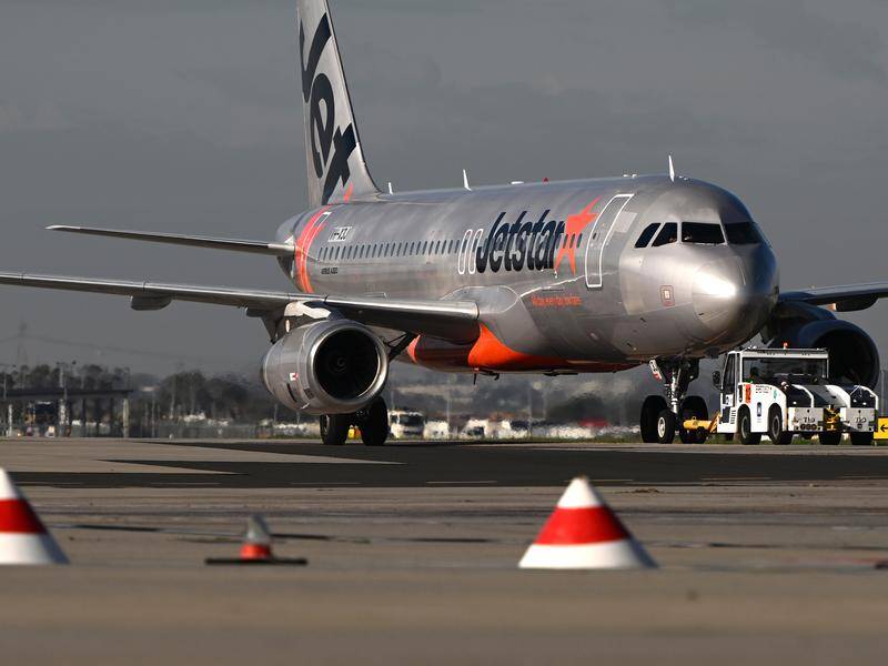 Jetstar is introducing a new charge for passengers with carry-on luggage. Photo: Joel Carrett/AAP PHOTOS Jetstar is introducing a new charge for passengers with carry-on luggage. Photo: Joel Carrett/AAP PHOTOS