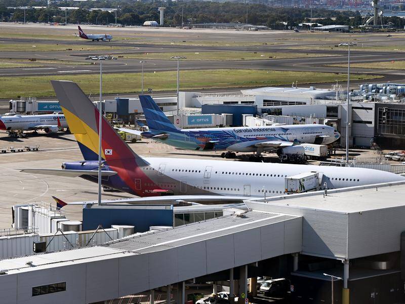 Police arrested a man after a bomb threat at one of the nation's busiest airports. Photo: Bianca De Marchi/AAP PHOTOS