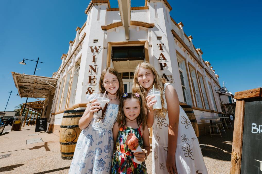 Three girls featured in Gulgong's submission enjoy a treat outside the Vault in Gulgong. Picture: Amber Creative Three girls featured in Gulgong's submission enjoy a treat outside the Vault in Gulgong. Picture: Amber Creative