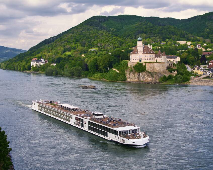 The most scenic stretch of the Danube Waltz cruise is the Wachau Valley, a medieval landscape of terraced vineyards ornamented with quaint villages, imposing church spires and ancient ruins. Picture by Viking River Cruises