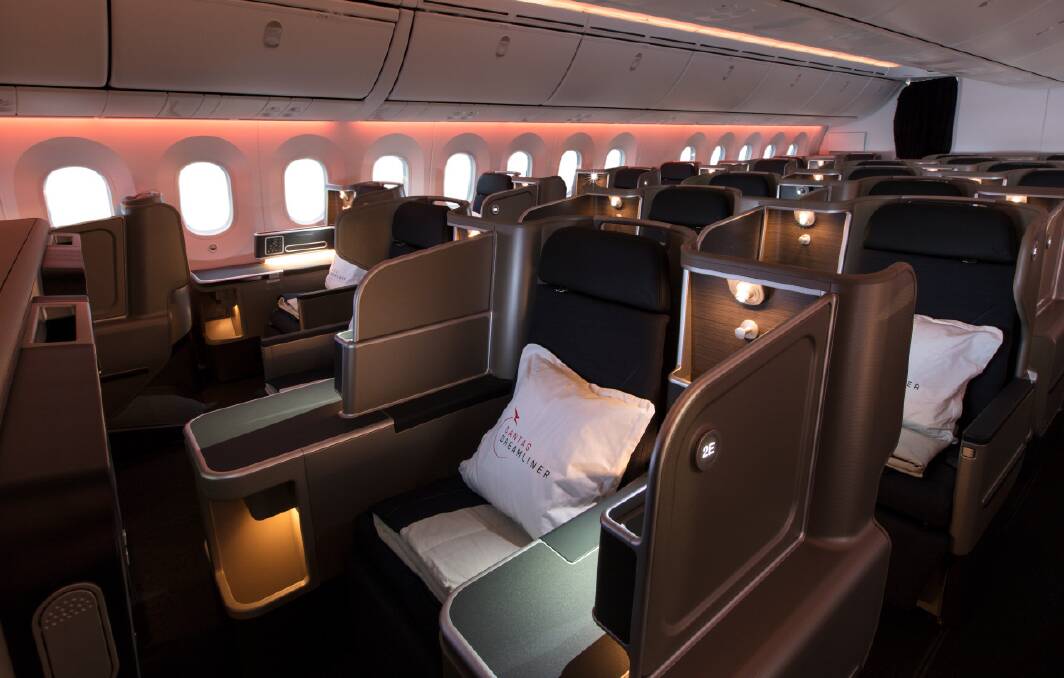 With your own personal privacy screen, you really do feel secluded on the Qantas Dreamliner in business class. Picture supplied