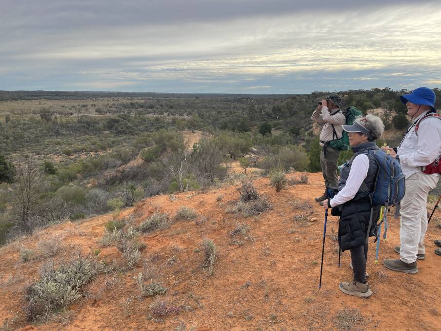 Murray River Trails provides optional walking poles while some guests bring their own binoculars to seek out the bird life. Picture: Janet Howie Murray River Trails provides optional walking poles while some guests bring their own binoculars to seek out the bird life. Picture: Janet Howie