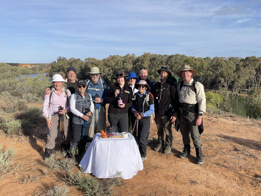 Mission accomplished! Our group celebrates on a clifftop after completing the 40-kilometre Murray River Walk. Picture: Janet Howie Mission accomplished! Our group celebrates on a clifftop after completing the 40-kilometre Murray River Walk. Picture: Janet Howie